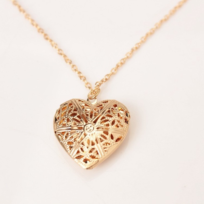 Кулон сердце (79 фото): золотые и серебряные украшения в виде половинки сердечка, модели из бисера
