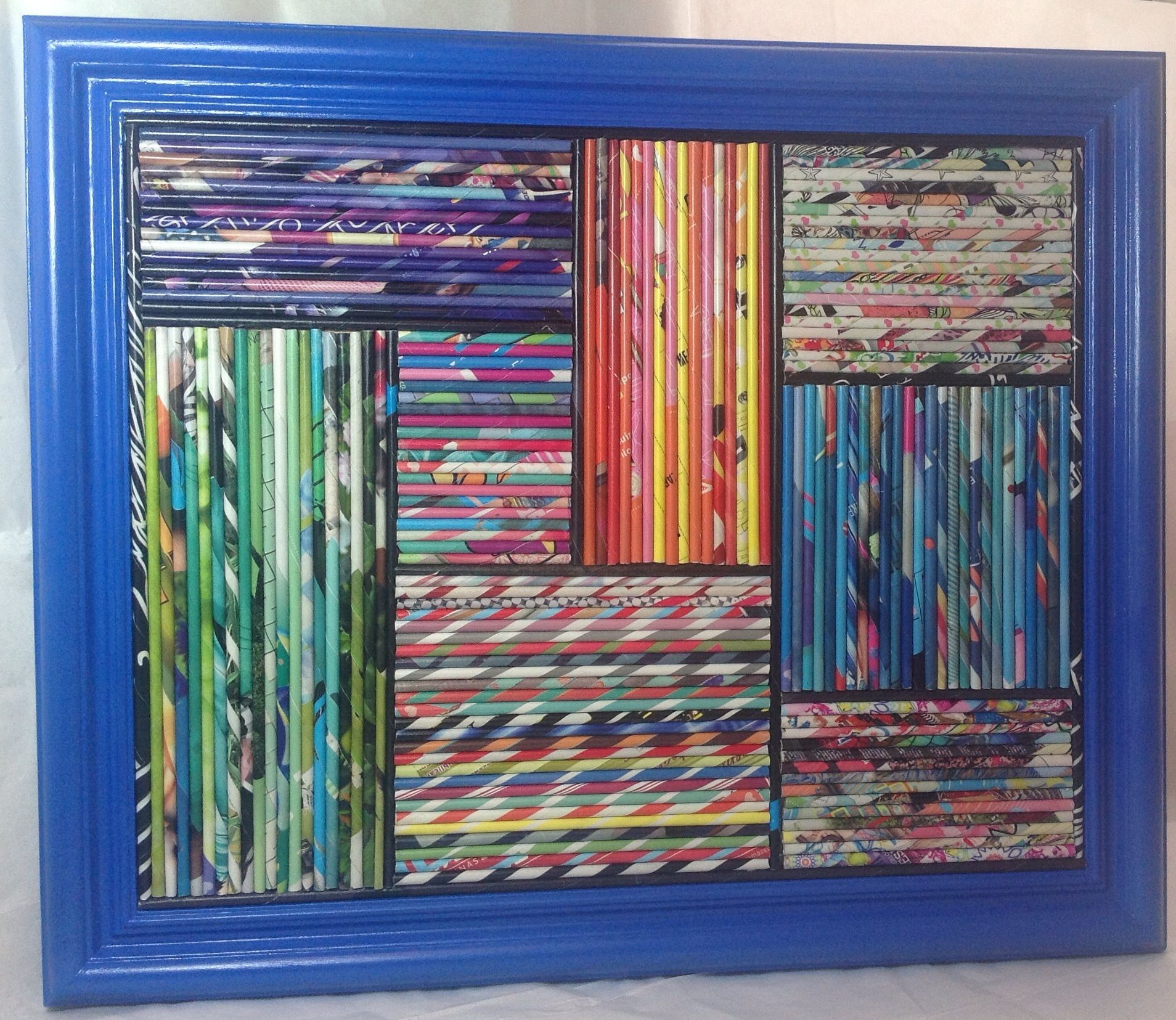 Декоративное панно из разноцветных газетных трубочек. плетение из газет